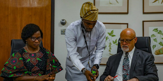 IITA and FUTA representatives discussing the partnership formalization.