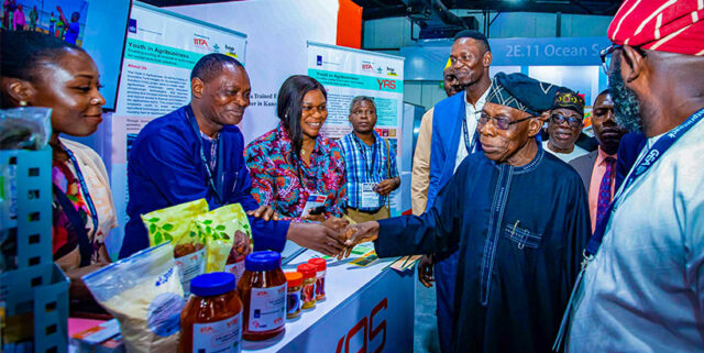 IITA Ambassador and Former President of Nigeria, Chief Olusegun Obasanjo, at the YAS booth during the exhibition.