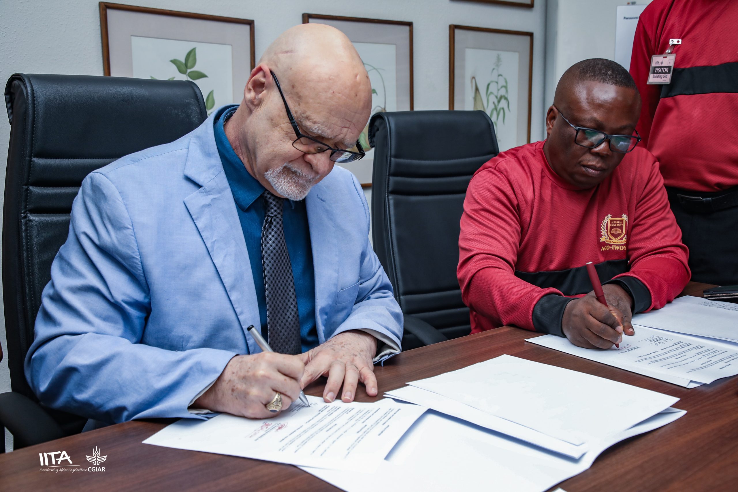 Dr. Kenton Dashiell and Aletheia University Vice Chancellor Prof. Amos Onasanya signing the MoU.