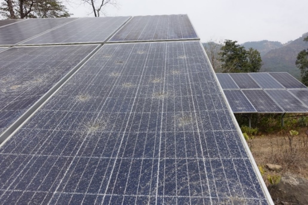 Photo of a solar panel with some signs of it having been vandalized