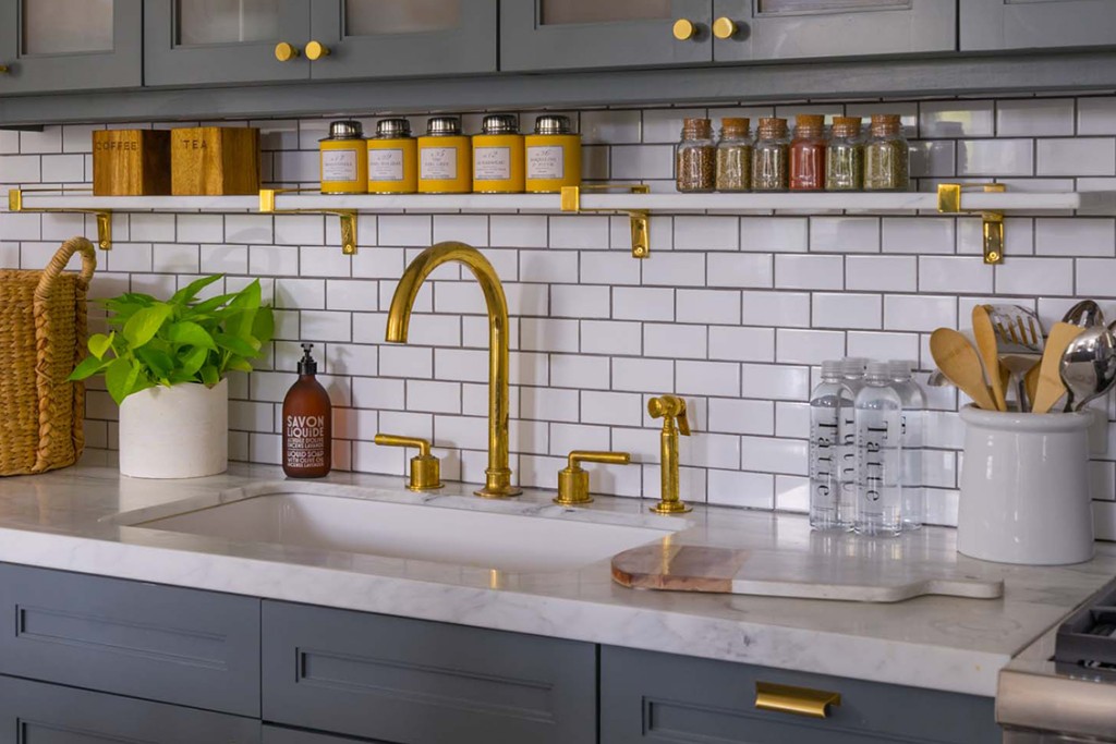 Henry Three Hole Gooseneck Kitchen Faucet, Metal Lever Handles and Spray | Highlight image 1