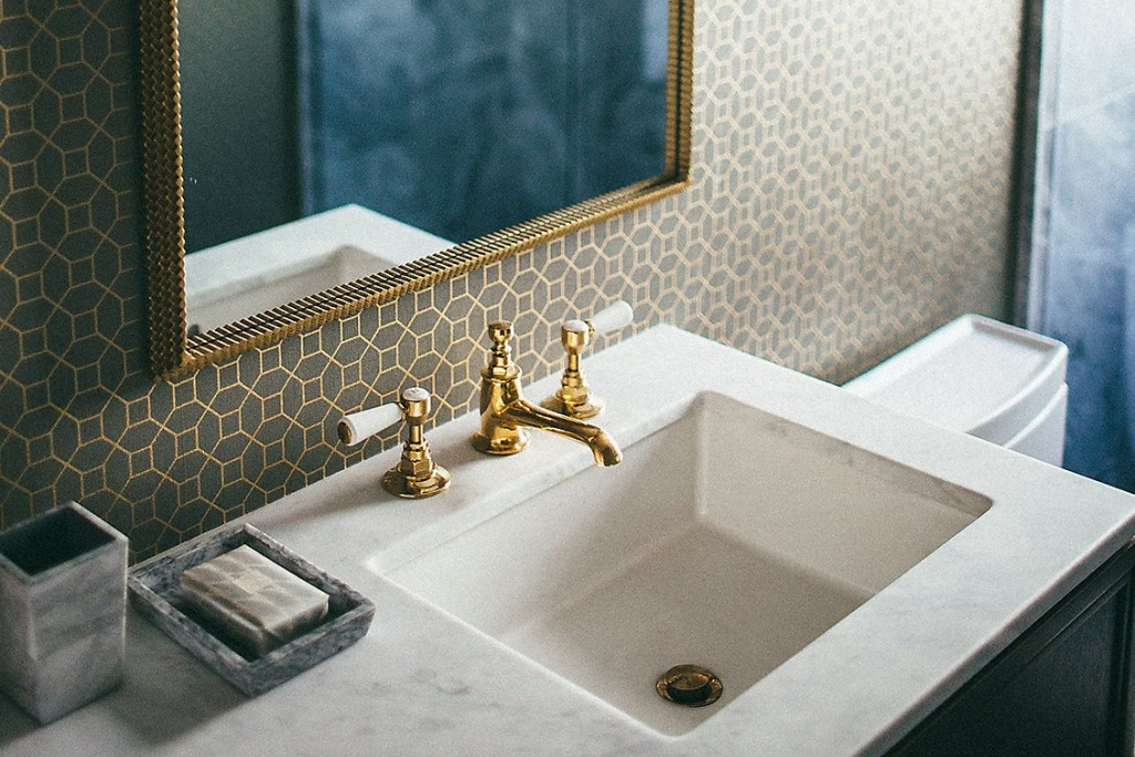 Highgate Low Profile Three Hole Deck Mounted Lavatory Faucet with White Porcelain Lever Handles | Highlight image 1