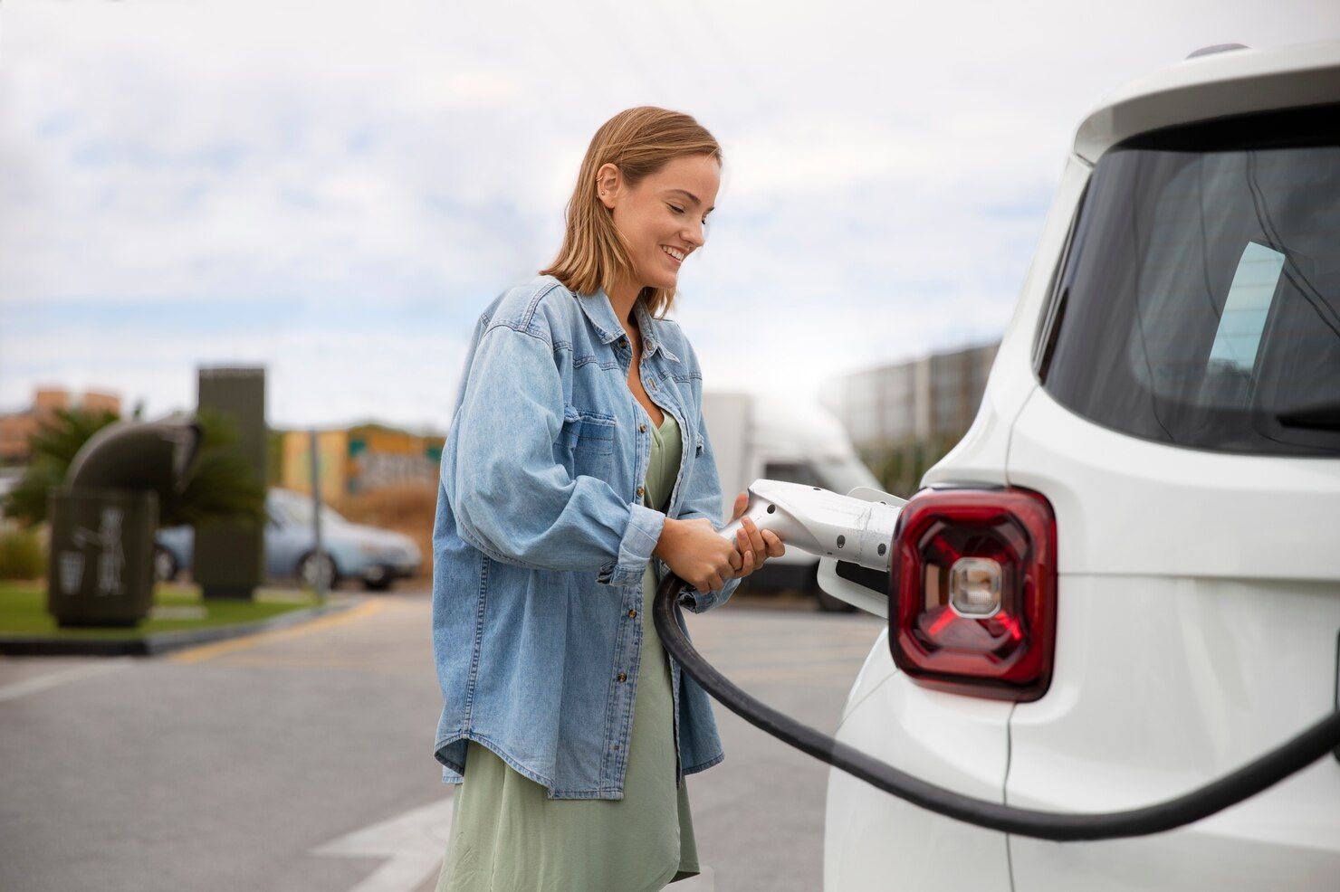 close-up-electric-car-charging_23-2149146241.jpg