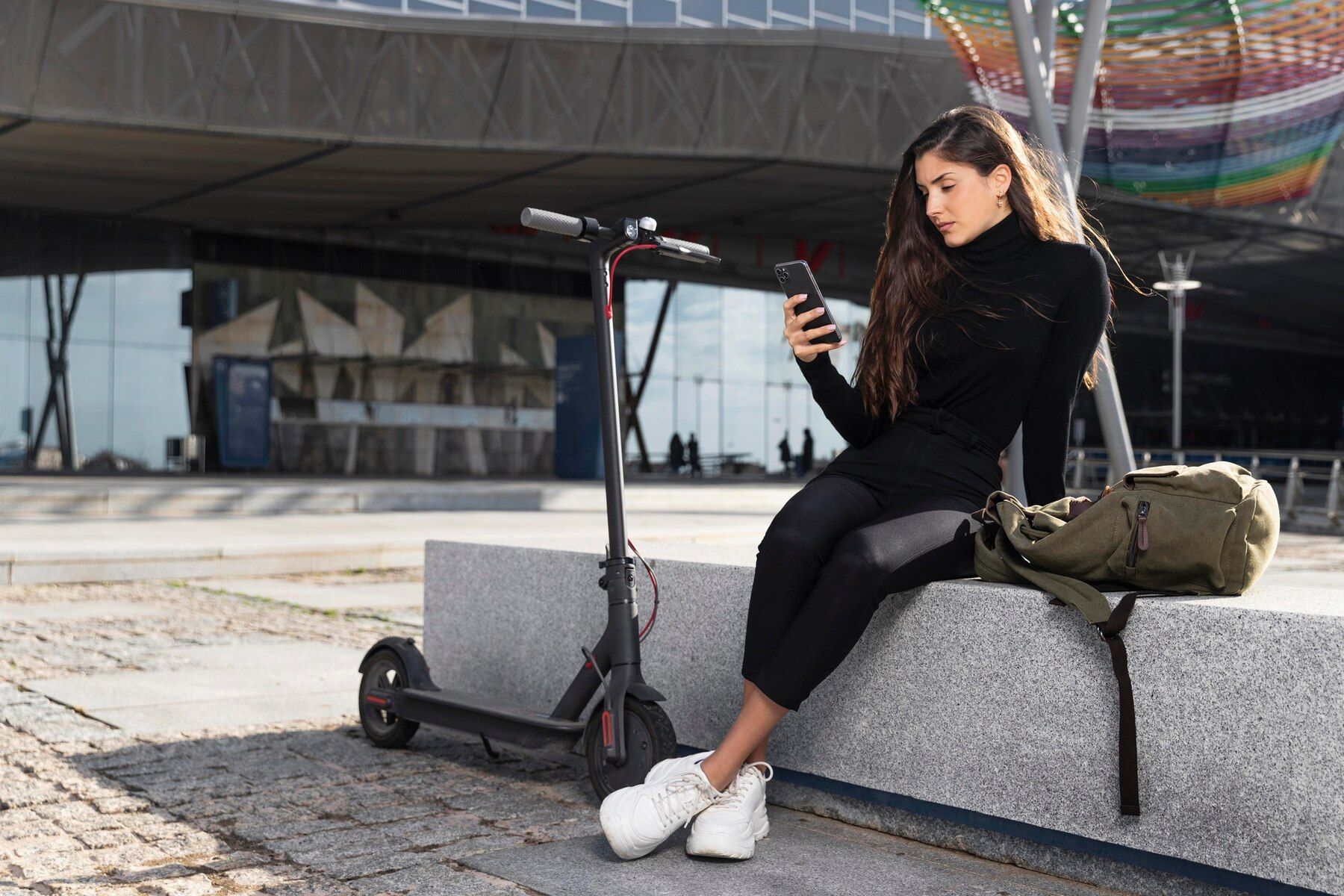 young-woman-sitting-her-scooter_23-2148959852.jpg