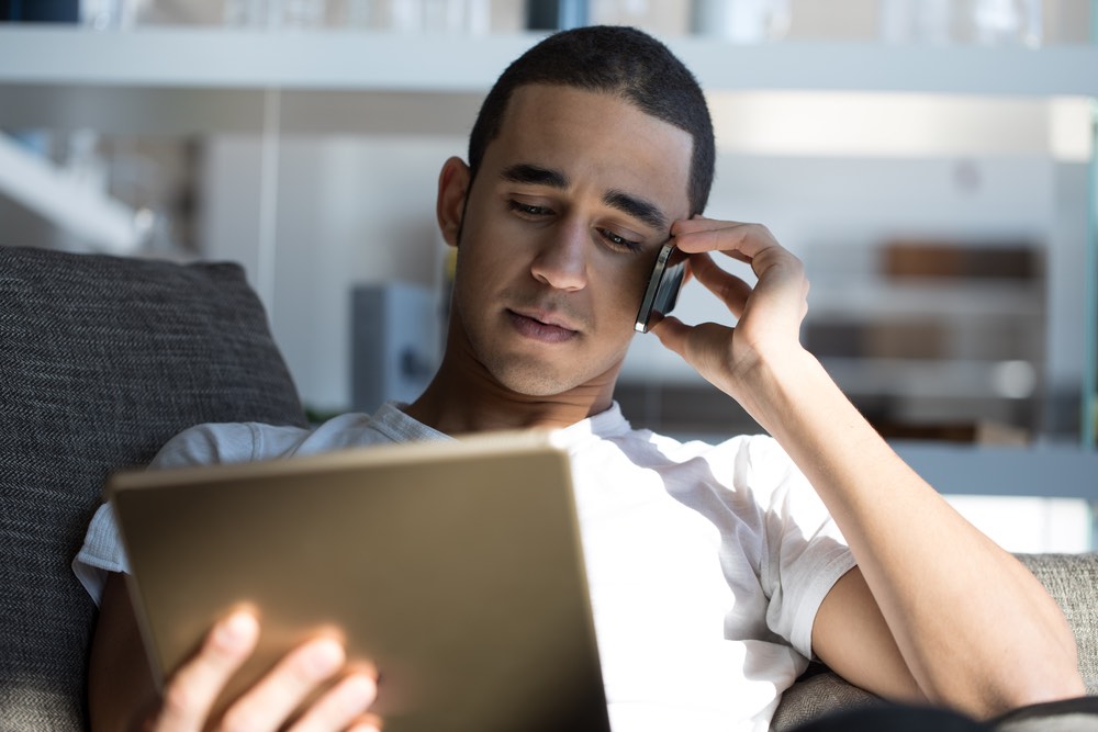 A customer browsing a website from their tablet