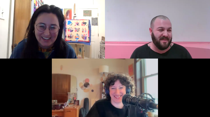 A screengrab of three people in a Zoom call. The person in the top left smiles warmly wearing circular glasses, and is in an art studio in front of a quilt-in-progress. The person in the top right looks to the side, they’re in front of a white and pink wall, and wear a black scoop neck shirt with tattoos peaking out. The woman in the bottom center laughs, wearing headphones with a podcasting mic in front of her.
