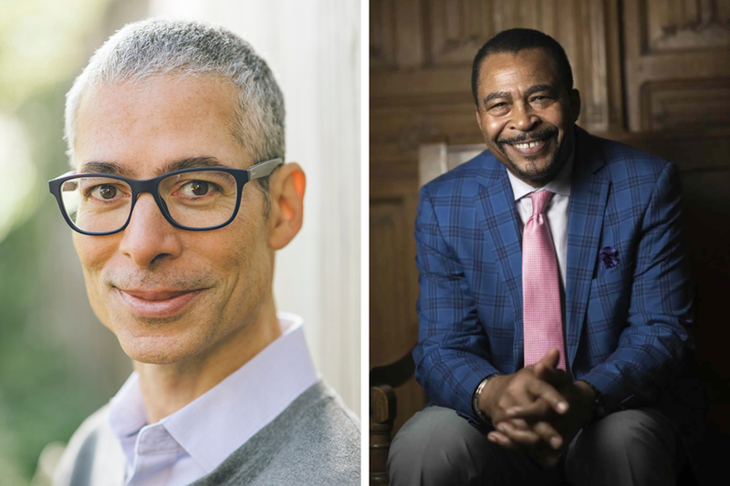 Side-by-side headshots of two Black men. The man to the left has an inviting smile, black glasses, and close-cropped gray hair. The man to the right smiles warmly with his hand loosely clasped in his lap, with a sharp blue plaid jacket, and a pink tie.