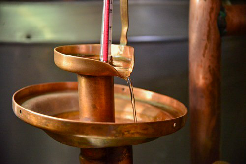 Copper alembic distilling alcohol from wine