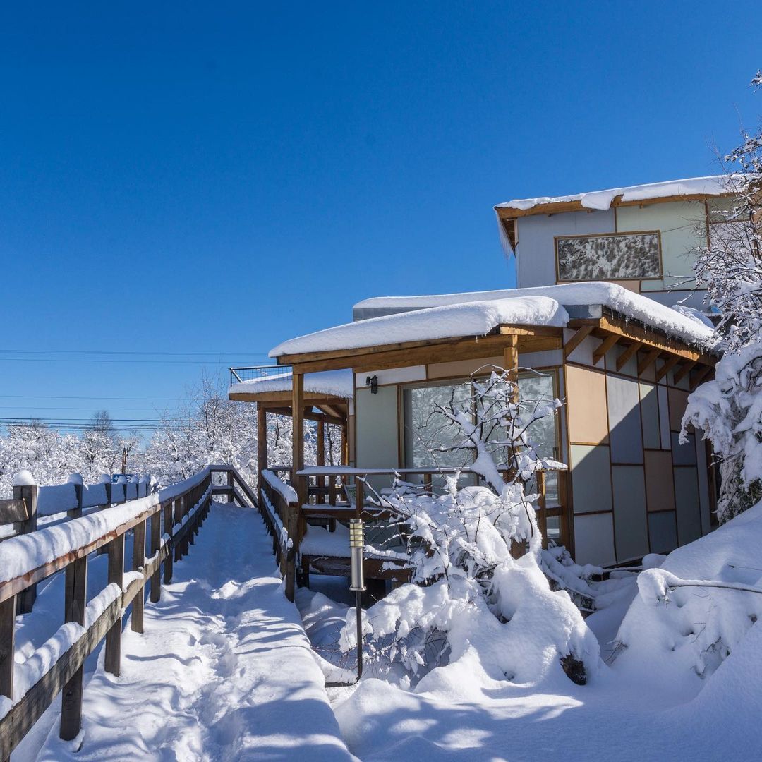 Ecobox cabins covered in snow