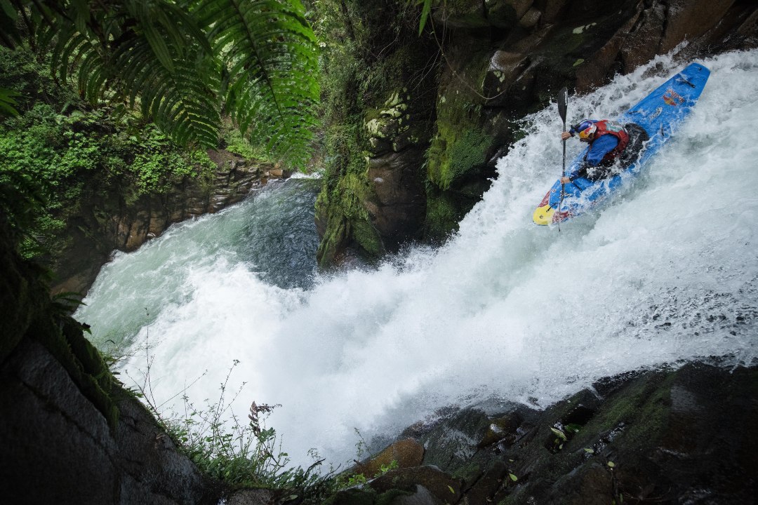 Aniol descending a waterfall