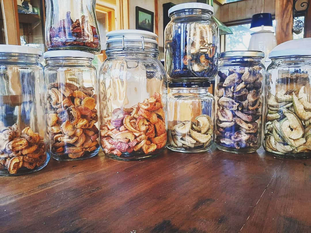 Glass jars with dehydrated fruit