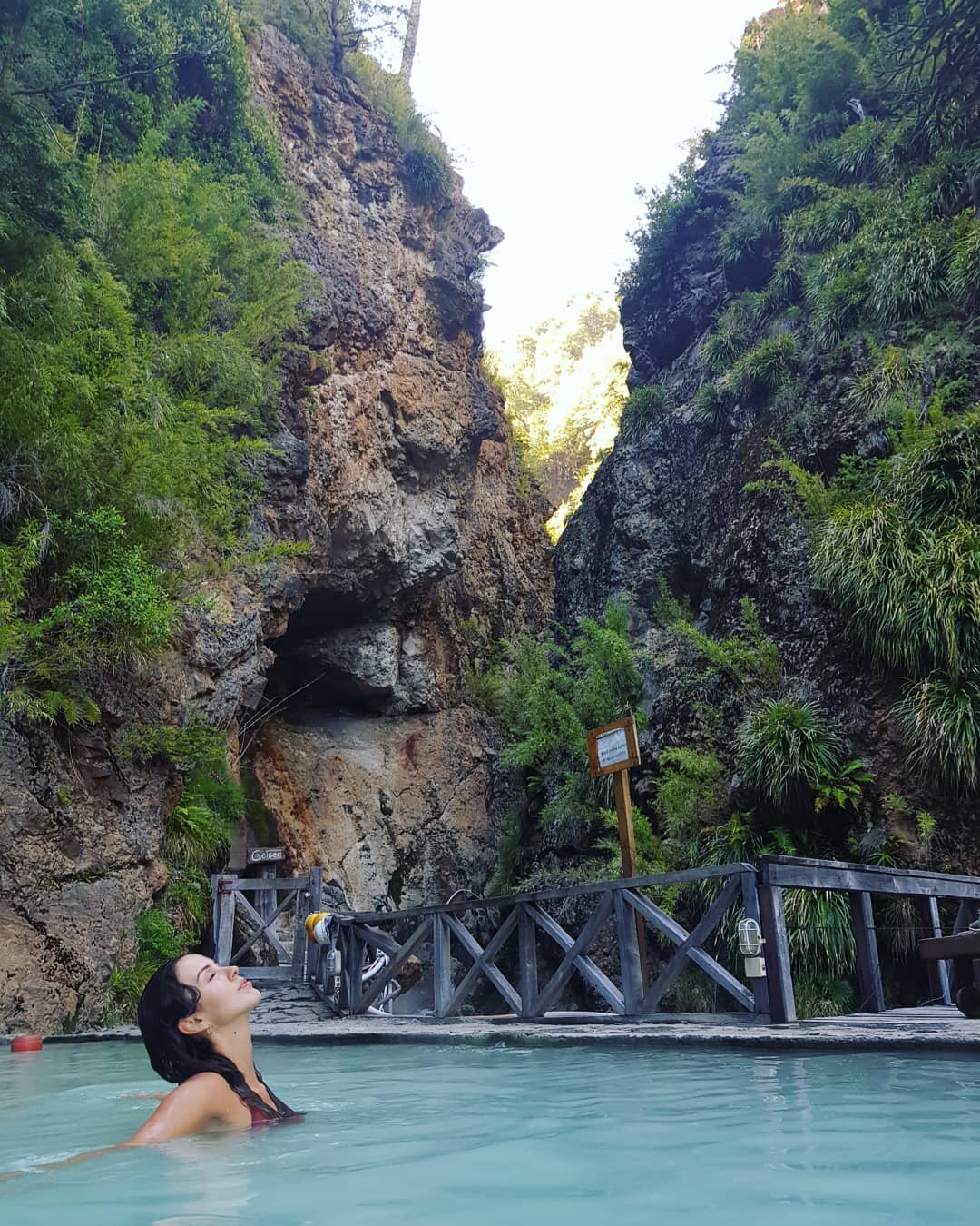 Woman enjoying thermal waters at Termas Malleco Hot Springs