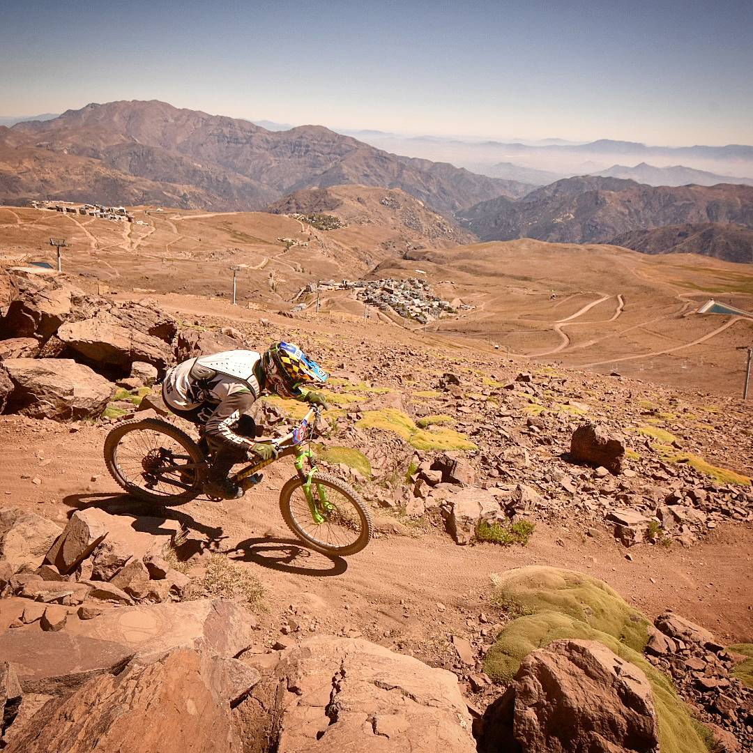 Cyclist descending the Andes 