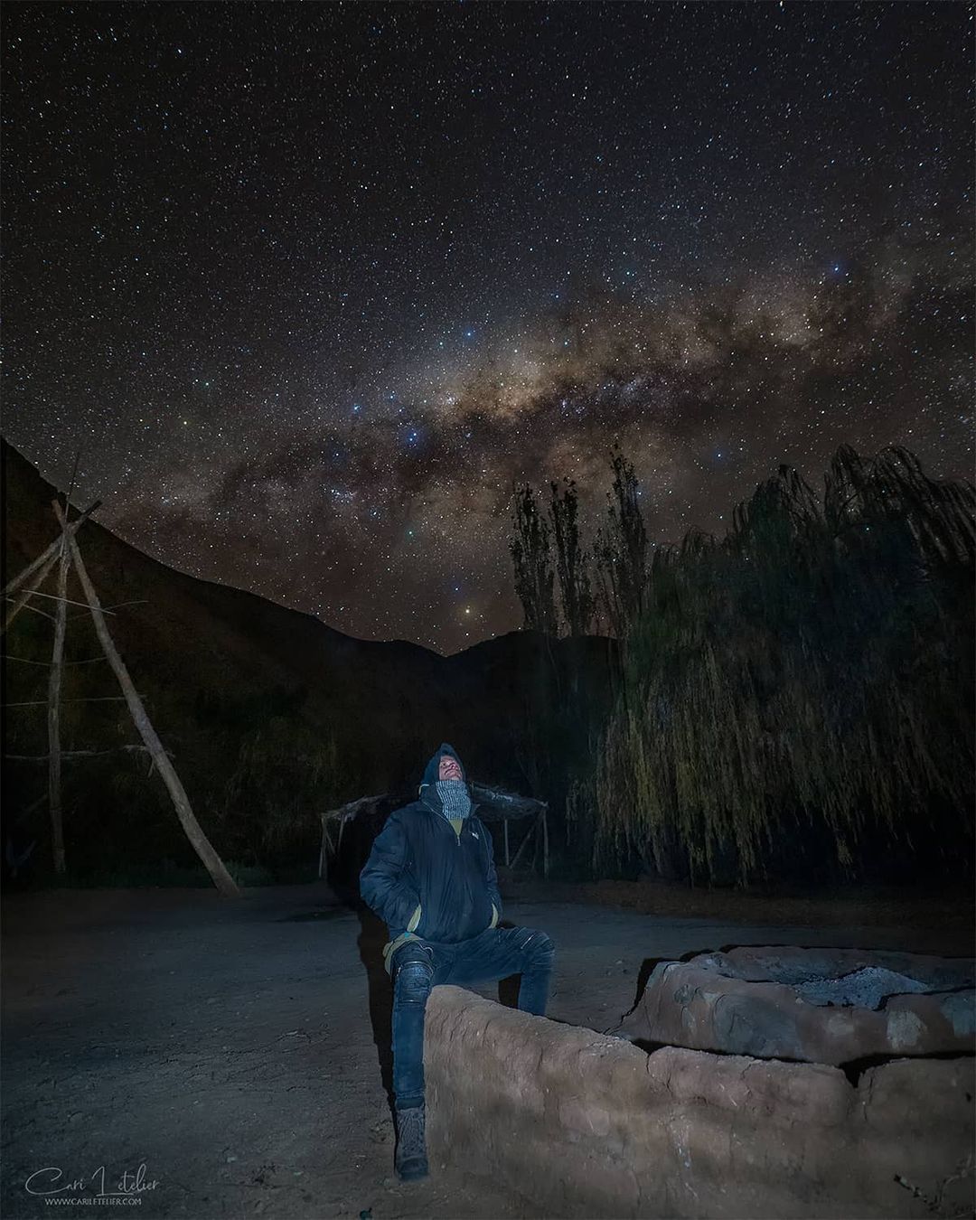 Man stargazing, Río Mágico campground, Cochiguaz.