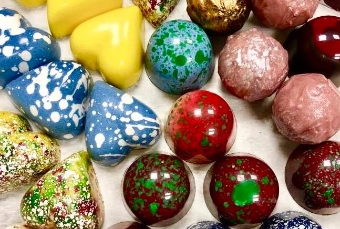 Colorful handmade chocolate chocolates from Hedh-Escalante Chocolatier