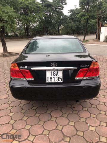 Cần bán gấp Toyota Camry LE sản xuất 2005 màu đen xe nhập