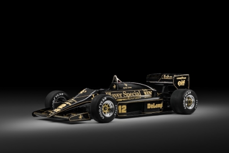 A black and gold race carAI-generated content may be incorrect.