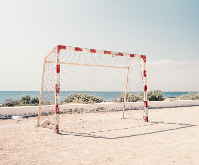 soccer net on a beach