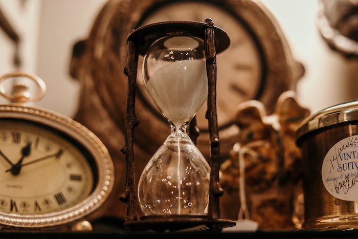 Clocks and hourglass