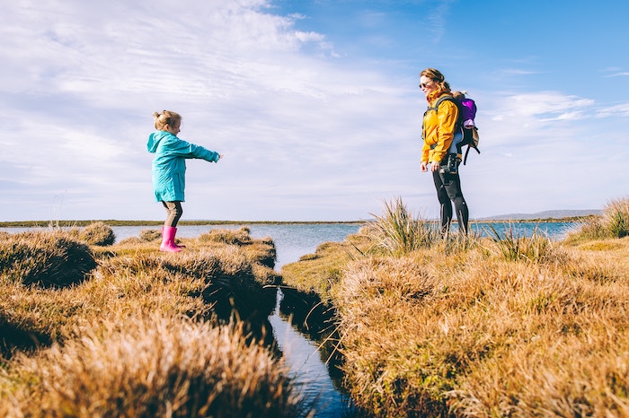 Girl and woman exploring outdoors