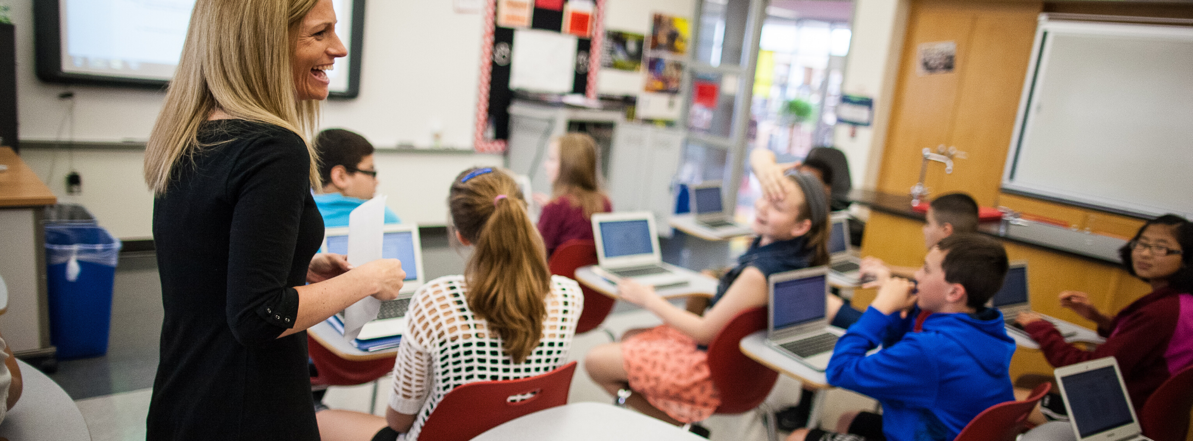 teacher teaching a classroom