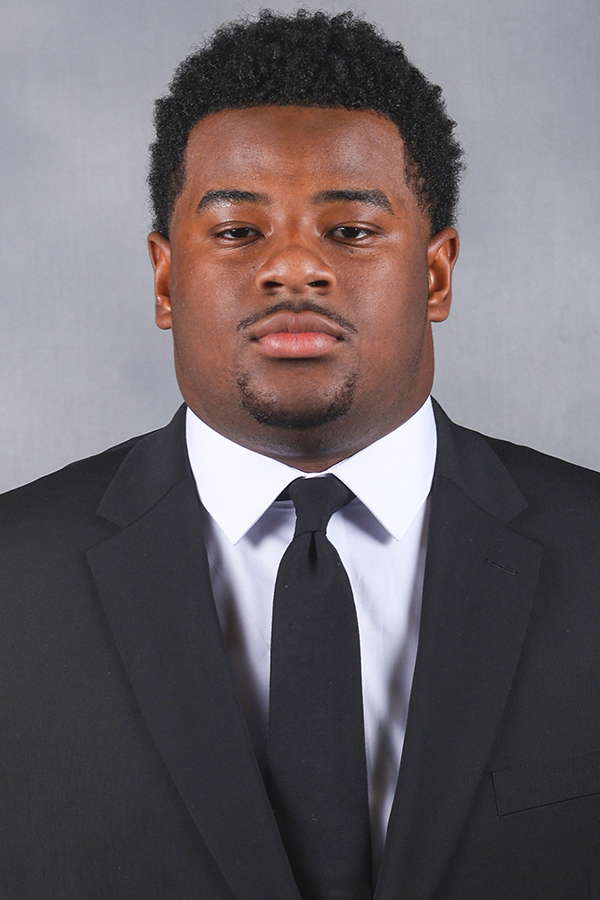 Kam Cody headshot