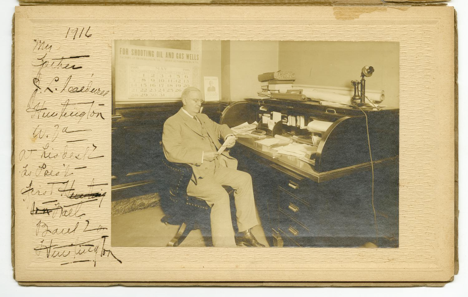 James Lewis Caldwell at his desk, 1916