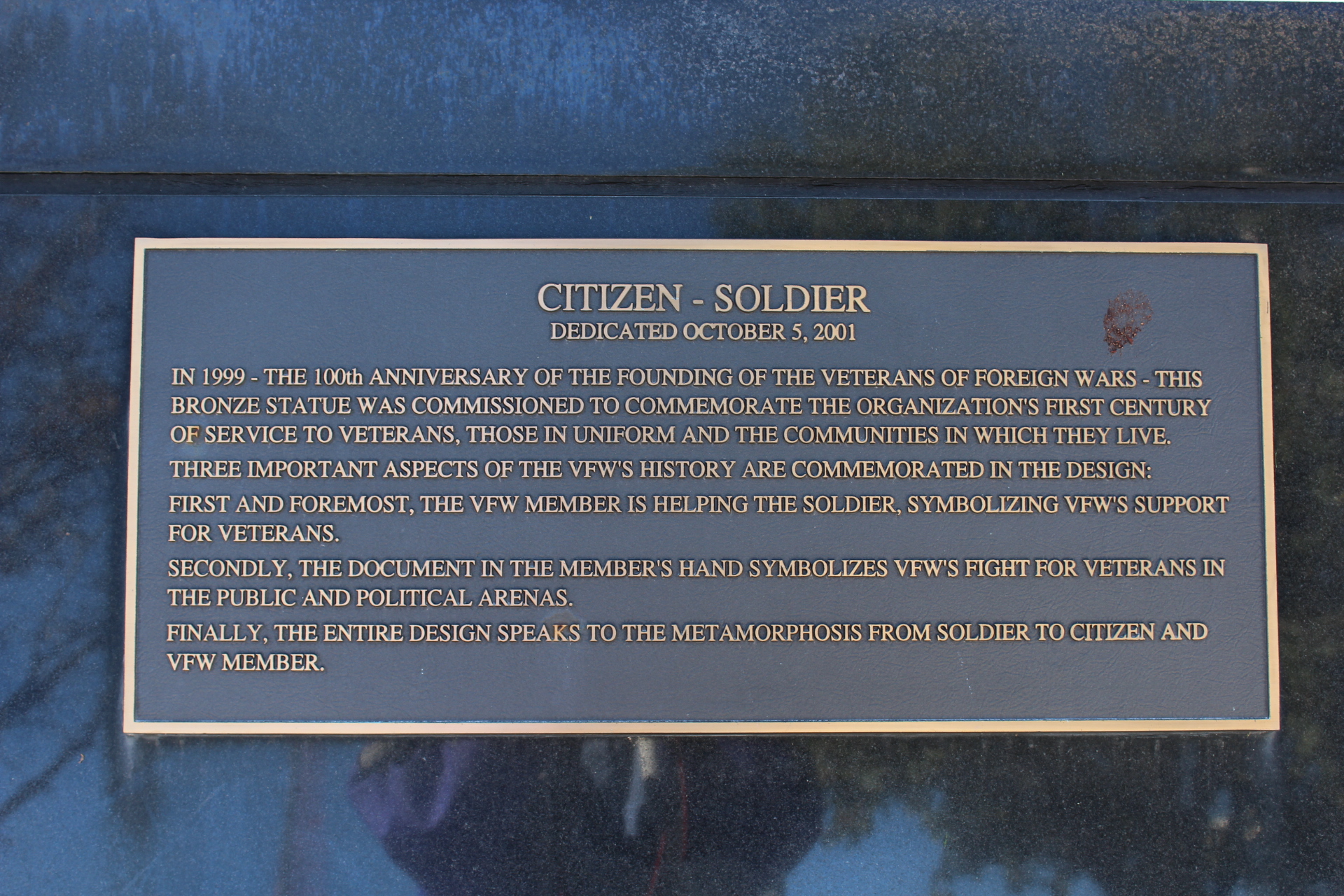 This is the plaque that is under the statue