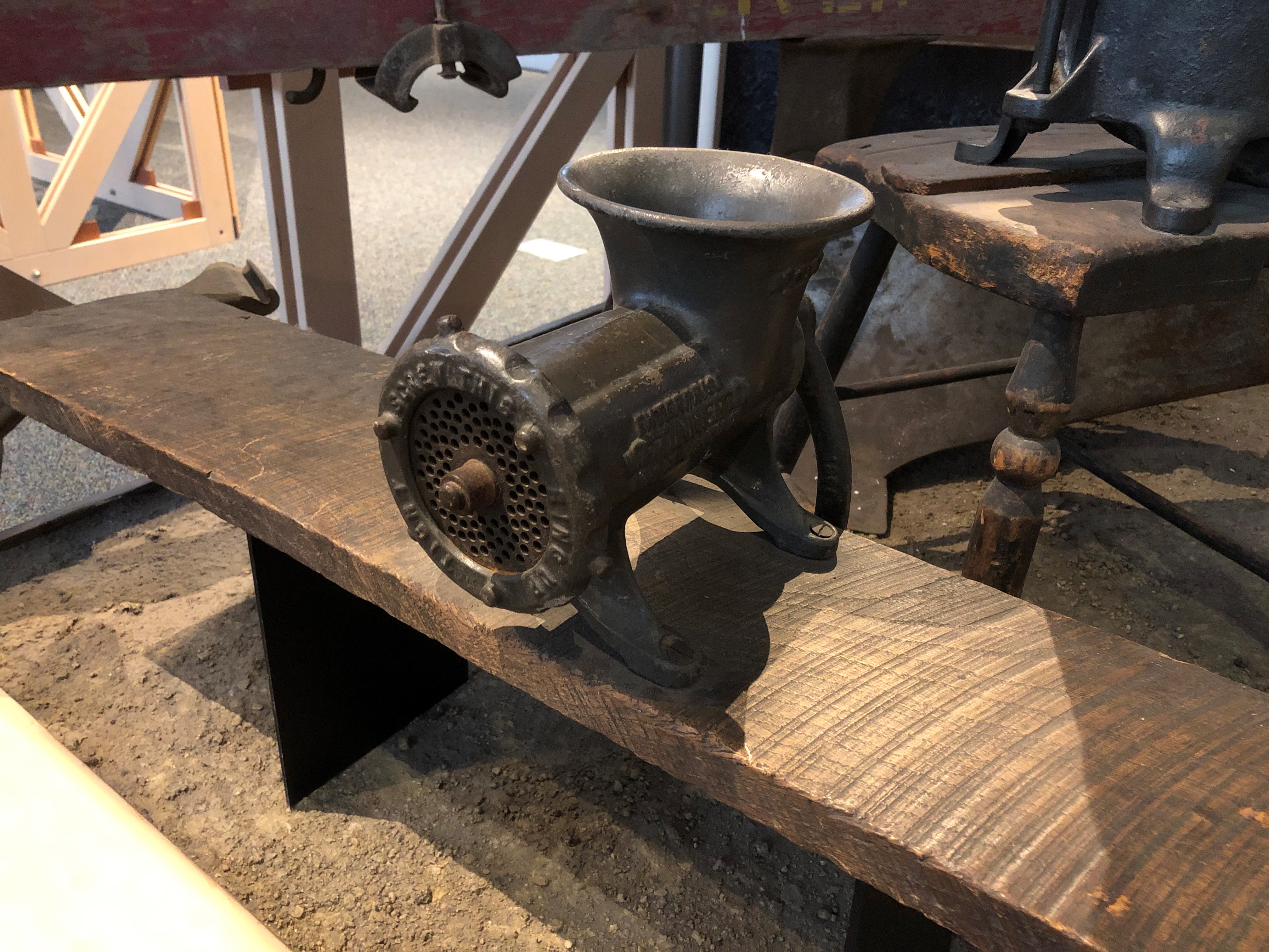 A meat grinder like this one would have been a necessary item for farming families wishing to process some of their meat into sausage.