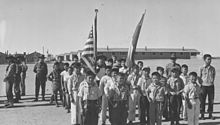 Boy Scout Memorial Day parade at the Granada War Relocation Center, Amache, Colorado, 1943.