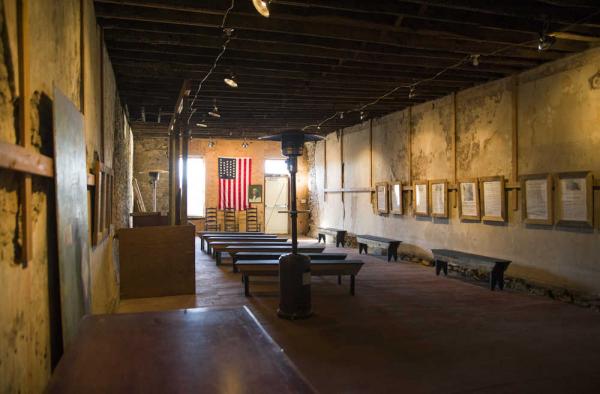 Despite extensive damage owing to years of neglect, the interior of the historic building is now open and used for school tours and other events.