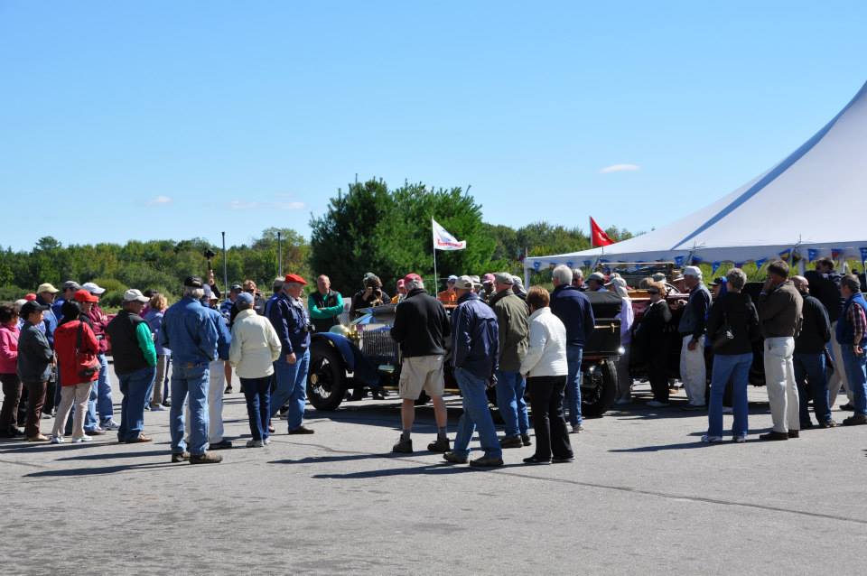 A crowd gathers as a museum collection vehicle is demonstrated at one of the organization's myriad annual seasonal events.