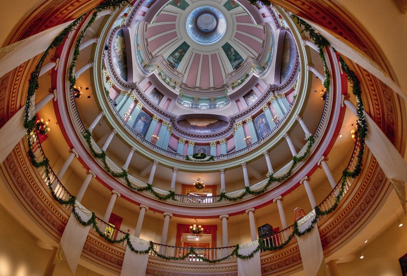 Central rotunda surmounted by a Renaissance style cast-iron dome and lantern.