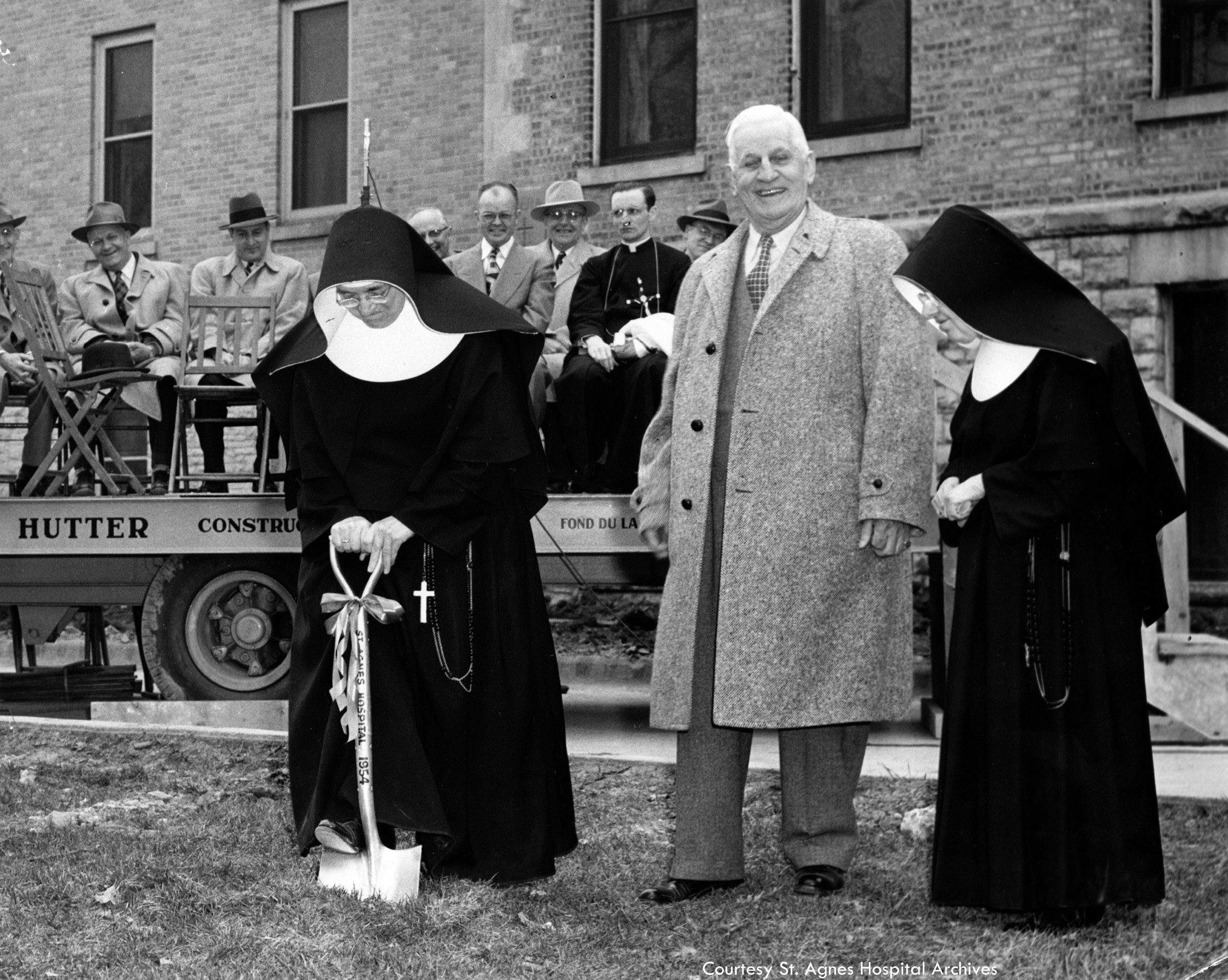 Groundbreaking for St. Agnes Hospital addition.  Left to right:  Sister Bernard Landgraf, George Hutter, and Sister Sebastian Schaller, April 20, 1954.