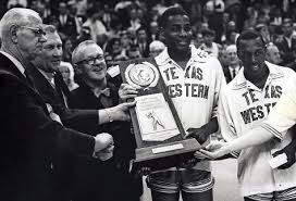 The 1965-66 National Champion Texas Western Miners receiving trophy.