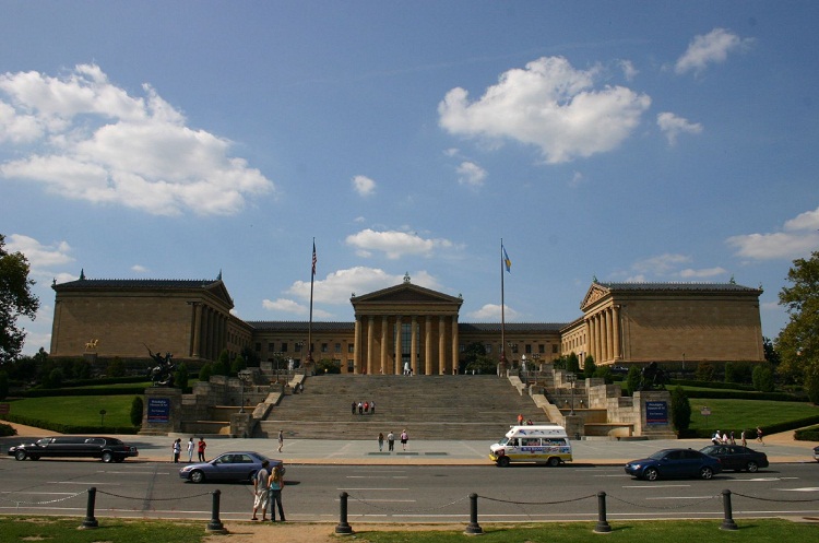 The Rocky Steps were immortalized in the 1976 movie 'Rocky,' when Sylvester Stallone famously ran up them and raised his arms triumphantly at the top. Photo by su1droot - Flickr. Licensed under CC BY 2.0 via Wikimedia Commons.