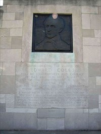 The memorial features a bronze image of Coles and an inscription that credits him for keeping slavery out of the Illinois Constitution.