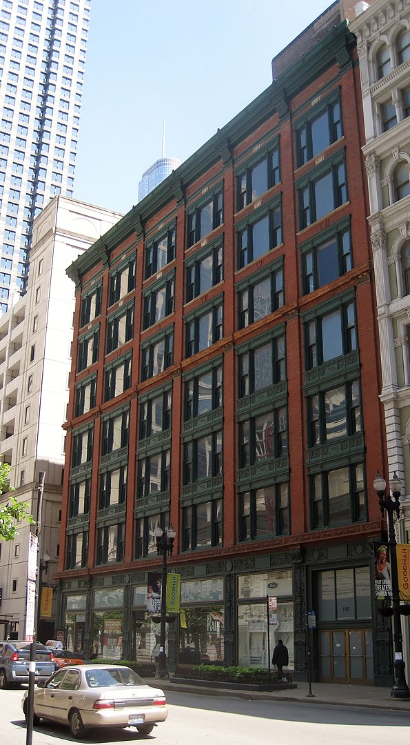 2012 Photo when the front facade of the former Oliver Building existed as part of what was known then as the Ford Theater. The Chicago School design and Chicago Windows are easily seen. It was designed by Holabird & Roche for the Oliver Typewriter Company. The top two floors were added in 1920.