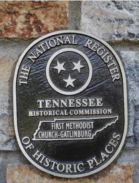 The National Register of Historic Places marker on church.