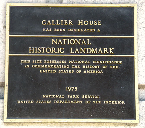 The plaque installed on the outside of the house deeming it a historical landmark.