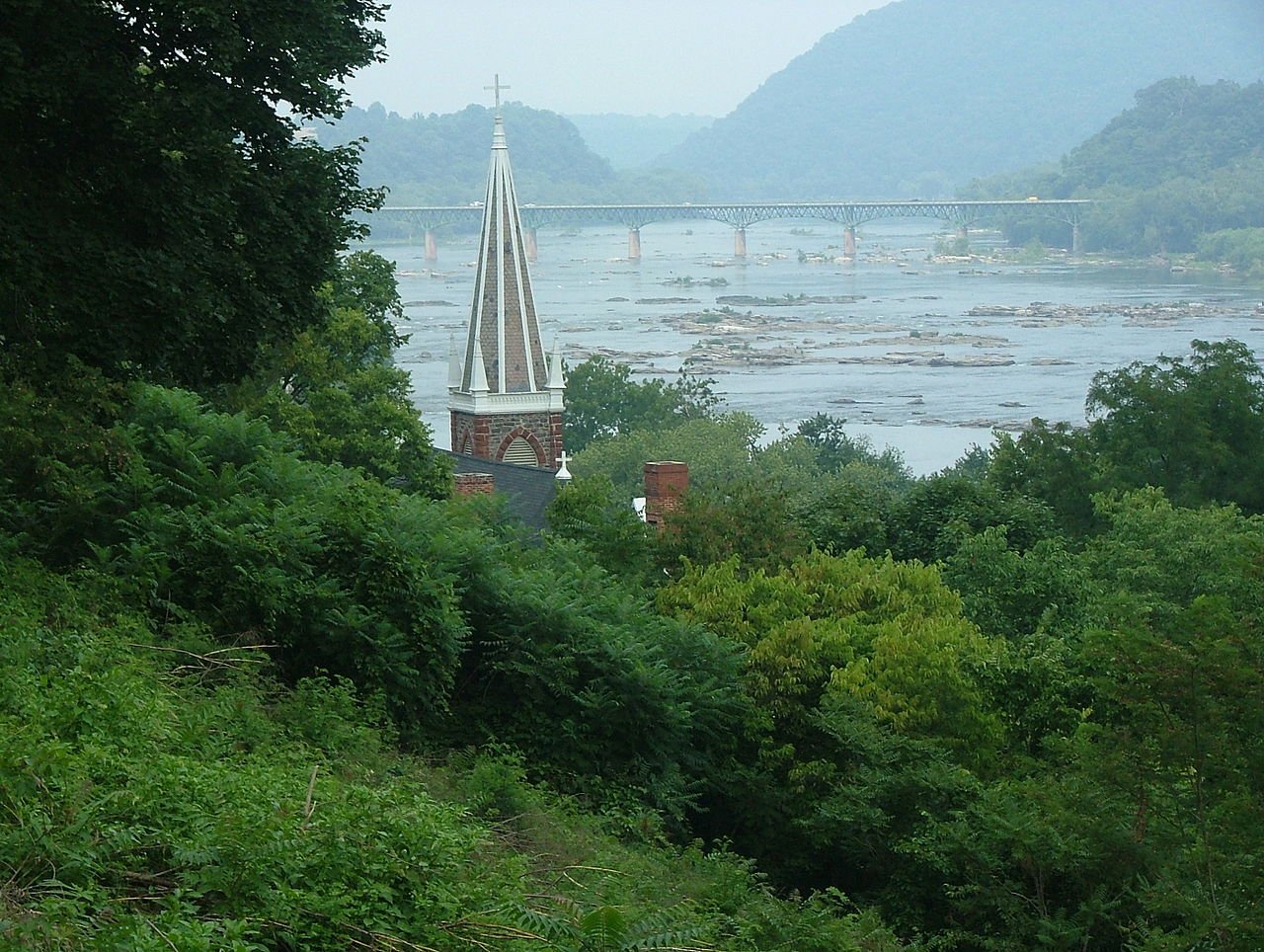 A view of the Shenandoah and Potomac Rivers from the rock. The steeple is from St. Peter's Church, built in 1833.