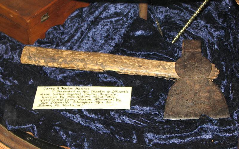 One of the hatchets given away by Carrie that was kindly donated to the home back a living relative of Charles Dilworth, of the Curtis Baptist Church, who received it in 1906. It rests in a display at the home.