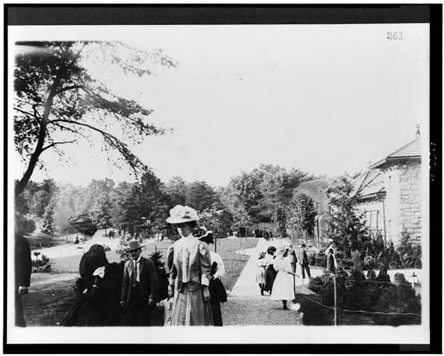 Guests walk along the main path at the National Zoo. Photo circa 1910s, courtesy of the Library of Congress.
