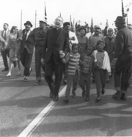 Photo from the Jack T. Franklin Exhibit. Marchers singing in unity while marching for Civil Rights.