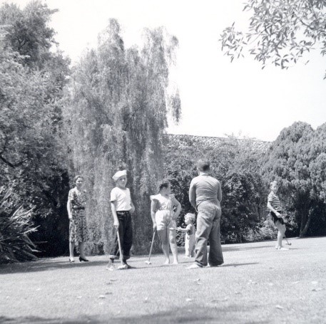 Llewellyn & Avis Bixby's grandchildren playing croquet on the lawn (1940s) 