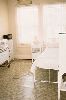 A photo taken of a hospital room.