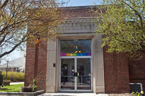The armory building was constructed in 1936 with funding from the federal government and funding from the city. The building served as both an armory and a municipal building until acquired by the university.