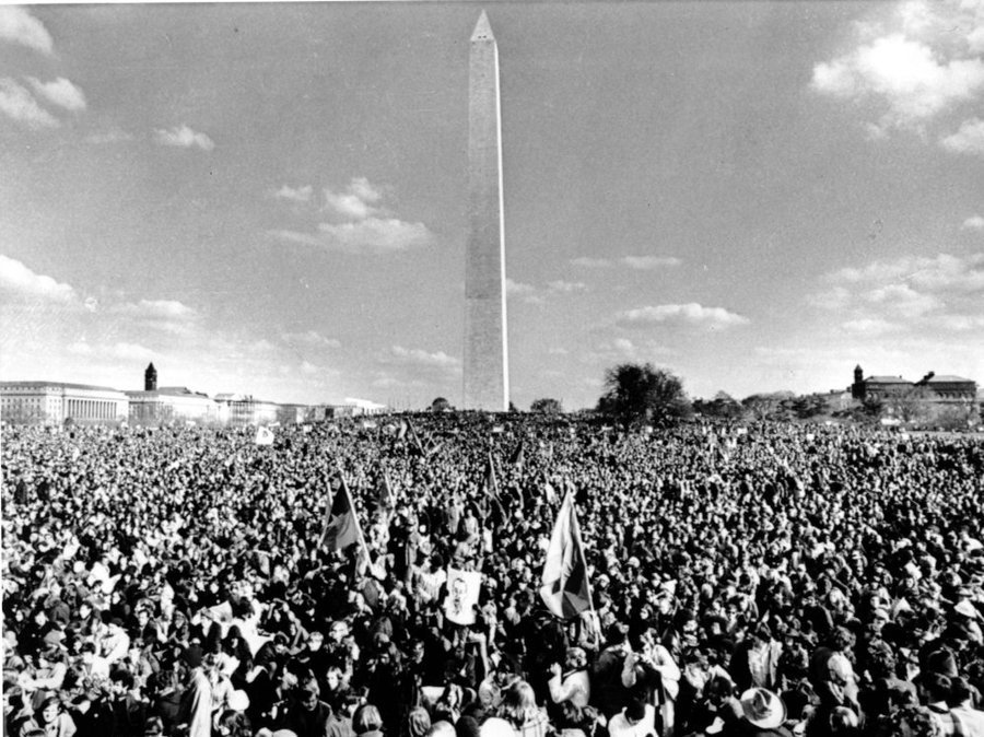 Protesters during the Vietnam War surround the Washington Monument.
