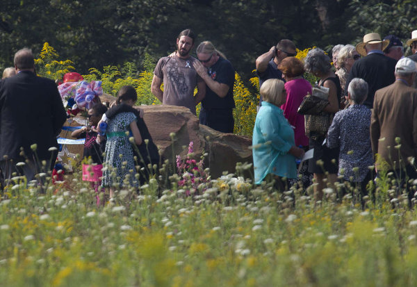 Family members of the passengers gather around the exact location where their loved ones died. They are the only people permitted to stand on the crash site.