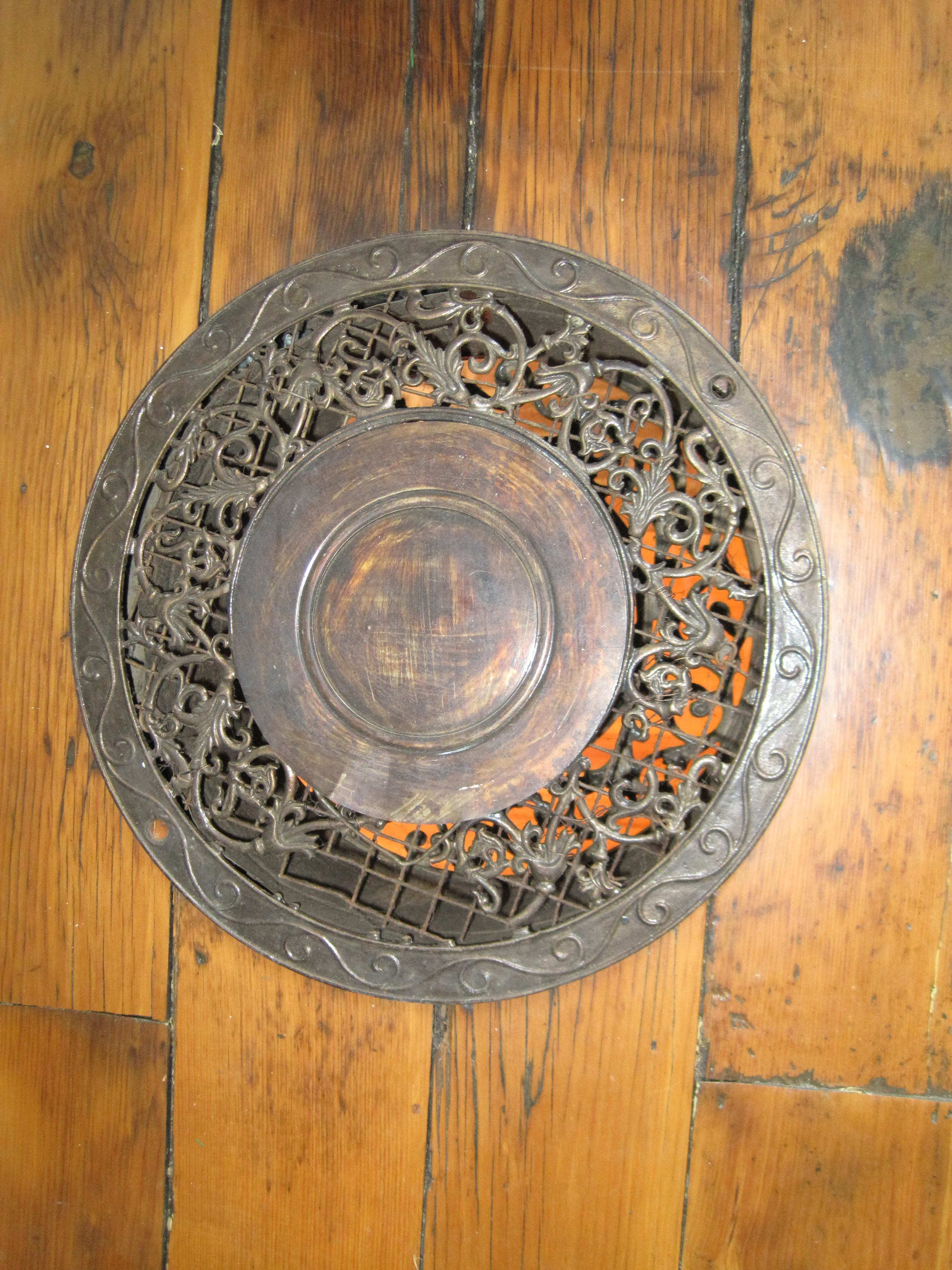 This decorative vent in the Hearth Room ceiling allowed heat from the fireplace oven to rise into the second floor children's bedroom